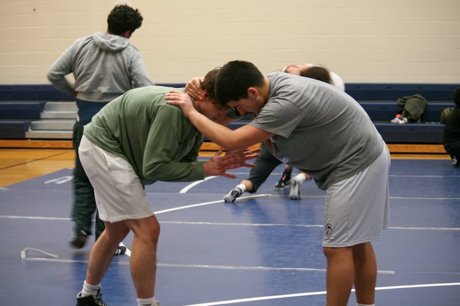 Woodward Builds a Family and a Contender in East Lansing Wrestling Program